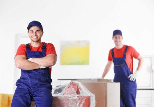 Professional house removals in Westkensington with moving van and packed boxes