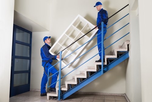 Professional removals in Westkensington with packed moving boxes