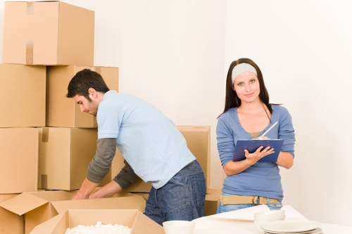 Packed boxes and home items arranged in a Westkensington storage unit